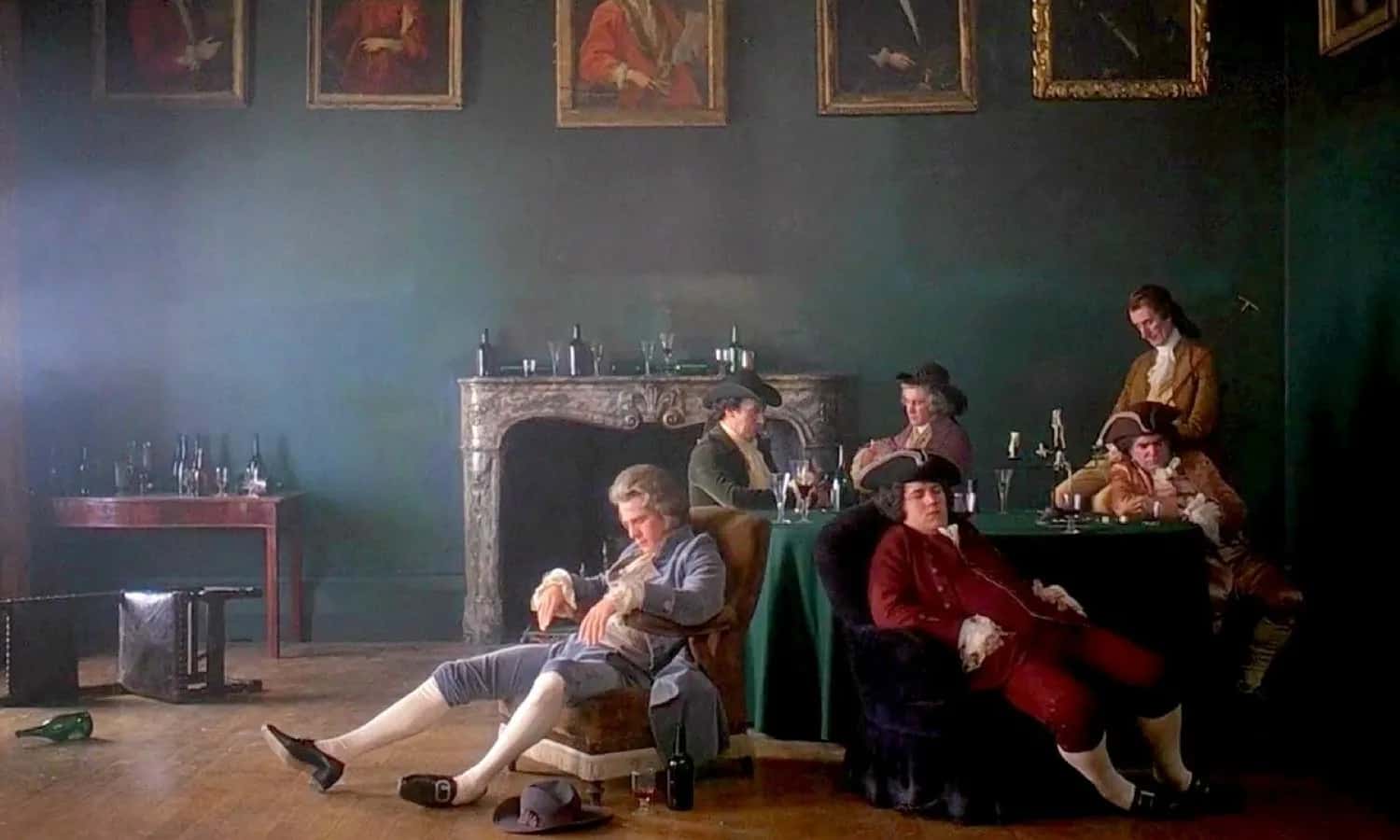 A group of 17th centurary nobility sits around a table in a candlelit room, 